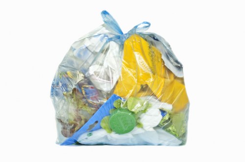 Stock image of commercial waste bins outside a business premises
