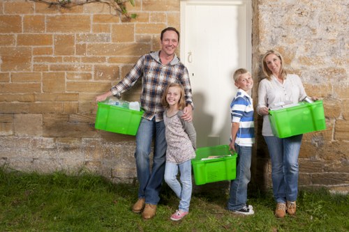 Professionals handling furniture clearance in a Golders Green home